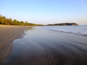 Playa Samara had a huge flat beach about 3 miles long.  It had very little surf because it is protected by a reef.  Super safe swimming beach.